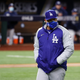 Dave Roberts walks back to the dugout after making a pitching change against the Tampa Bay Rays during the 5th inning.